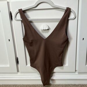 Sexy Babaton bodysuit in a light brown color